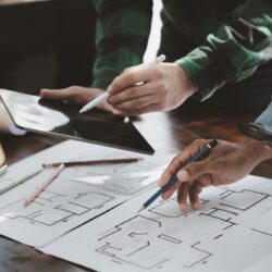 The,Home,Design,Architects,Are,Reviewing,The,House,Plan,Draft,